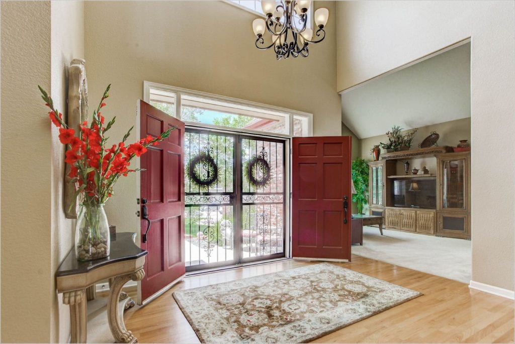 The wrought iron front entry doors.