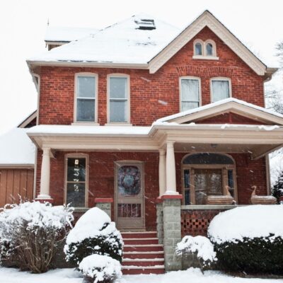 Brick home on a snowy, cold winter day